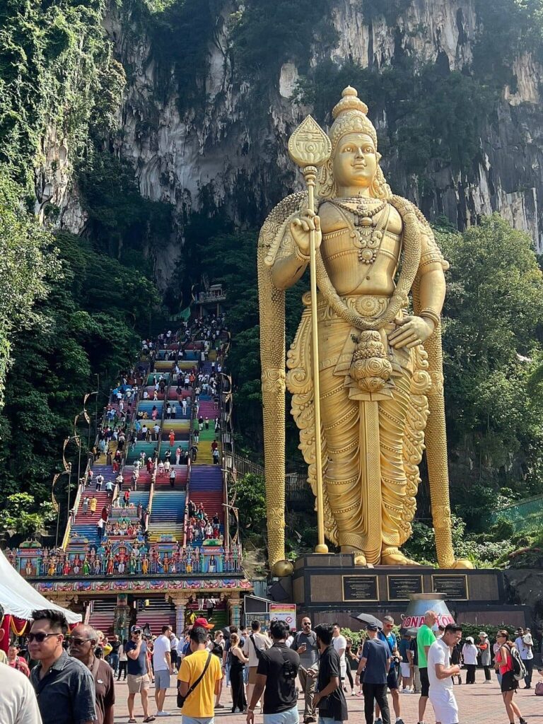 The Lord Murugan statue at Batu Caves, a highlight of our private tour to KL from Singapore.