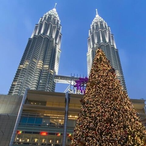 The Petronas Twin Towers in Kuala Lumpur, a highlight of the SGMY private tour.