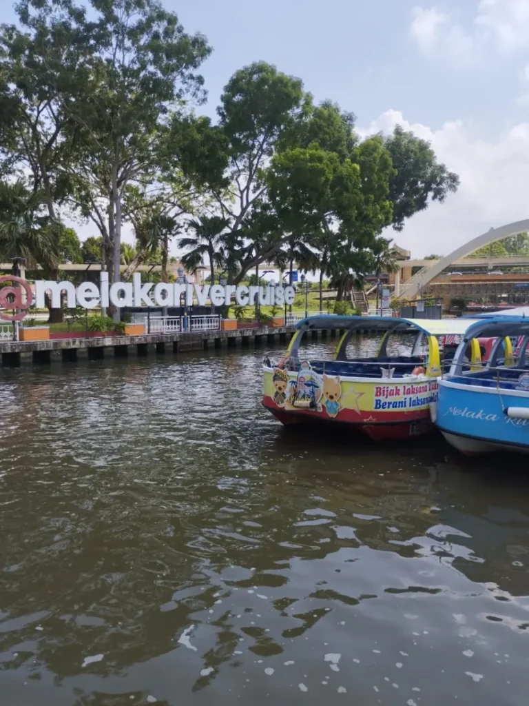 Melaka River Cruise boats beside the riverside